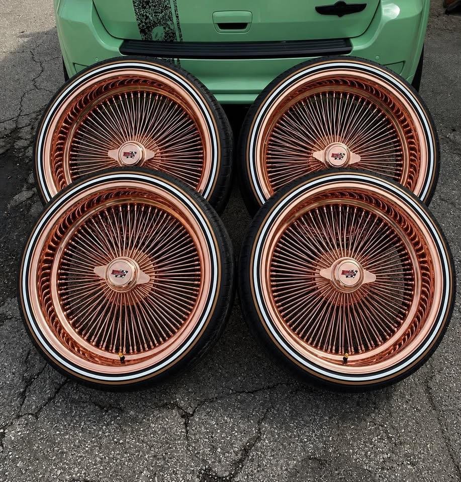 24s rose gold Daytons wire wheels available with matching steering wheel