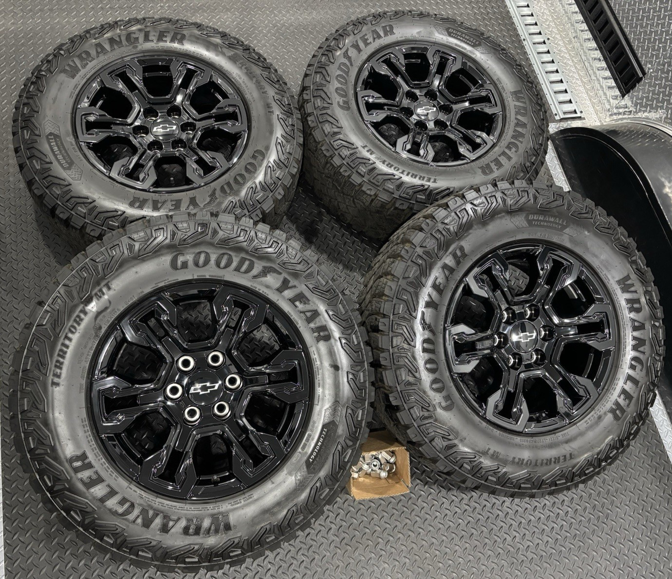 18-inch-Chevy-Silverado-ZR2-OEM-black-wheels-with-tires-and-TPMS-sensors-set-of-4 18″ Chevy Silverado ZR2 OEM Black Wheels with Tires & TPMS Fits Silverado 1500 LTZ | GMC Sierra AT4 | Free Shipping | Set of 4 - Image 1